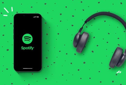 spotify-iphone-and-headphones-on-a-green-background