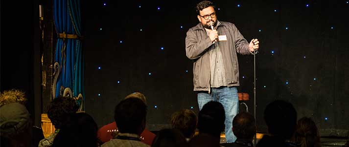 Stand up comedian on stage