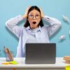 stressed student with laptop, hourglass and alarm clock