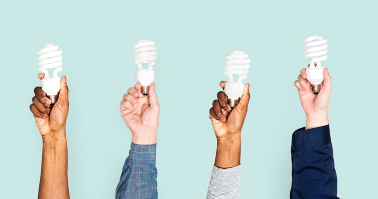 people holding light bulbs