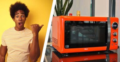 Shocked man and orange microwave
