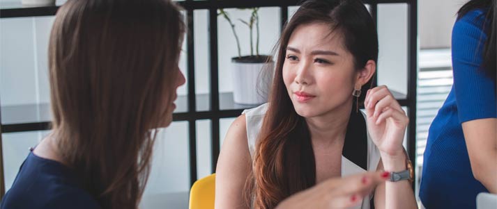 two women talking