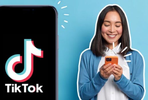 woman holding a phone and phone with tiktok logo