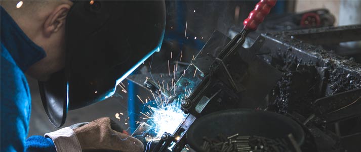 man welding