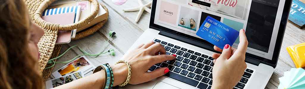 woman shopping for deals on laptop