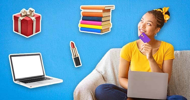 woman holding card with books, lipstick, laptop and a gift