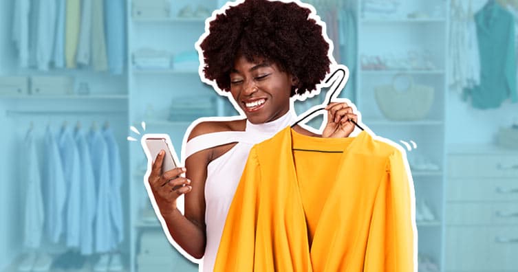 Woman holding dress and phone