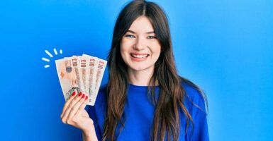 Woman holding money