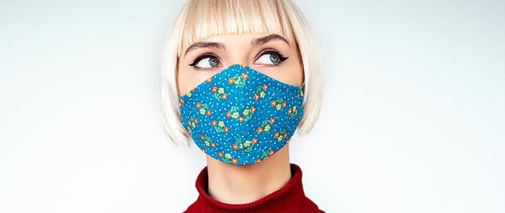 Woman wearing blue face mask