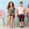 three women waiting for an interview