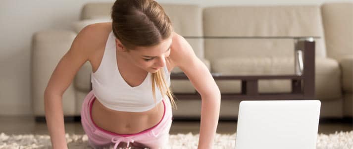 woman exercising at home